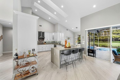 This stunning, updated home blends modern style with everyday on Stonebridge Golf and Country Club in Florida - for sale on GolfHomes.com, golf home, golf lot