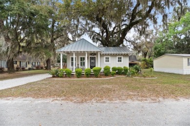 Is this not the CUTEST coast house you've seen?! Well it's on Sapelo Hammock Golf Club in Georgia - for sale on GolfHomes.com, golf home, golf lot