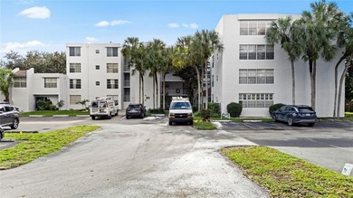 Located in the desirable Pine Island Ridge - Live Oak community on Pine Island Ridge Country Club in Florida - for sale on GolfHomes.com, golf home, golf lot