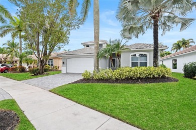 Step into perfection with this move-in-ready 6/4 sanctuary on Weston Hills Country Club in Florida - for sale on GolfHomes.com, golf home, golf lot