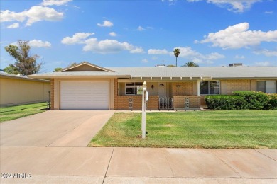 Double Fairway Home on the 10th hole.  This twin home has been on Sun City Country Club in Arizona - for sale on GolfHomes.com, golf home, golf lot