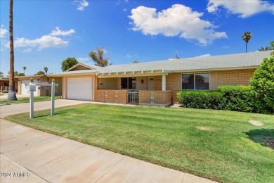 Double Fairway Home on the 10th hole.  This twin home has been on Sun City Country Club in Arizona - for sale on GolfHomes.com, golf home, golf lot