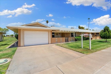 Double Fairway Home on the 10th hole.  This twin home has been on Sun City Country Club in Arizona - for sale on GolfHomes.com, golf home, golf lot