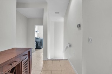Discover the epitome of Florida living at 3435 Laurel Greens Ln on Cypress Woods Golf and Country Club in Florida - for sale on GolfHomes.com, golf home, golf lot