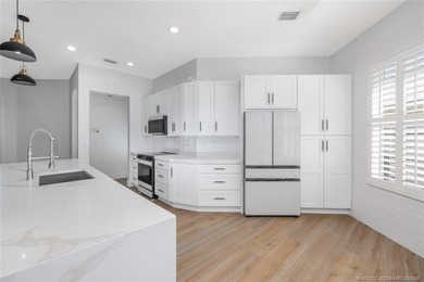 ARCHITECTURAL DIGEST WORTHY!!! EXTENSIVELY REMODELED 3B/2b/2c on  in Florida - for sale on GolfHomes.com, golf home, golf lot