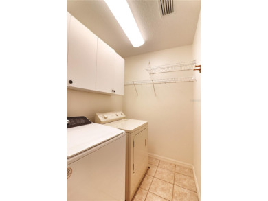 2021 HVAC system! 2+ golf cart garage with air-conditioned on Monarch At Royal Highlands in Florida - for sale on GolfHomes.com, golf home, golf lot