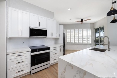 ARCHITECTURAL DIGEST WORTHY!!! EXTENSIVELY REMODELED 3B/2b/2c on  in Florida - for sale on GolfHomes.com, golf home, golf lot