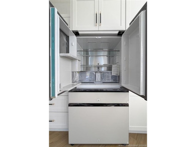 ARCHITECTURAL DIGEST WORTHY!!! EXTENSIVELY REMODELED 3B/2b/2c on  in Florida - for sale on GolfHomes.com, golf home, golf lot