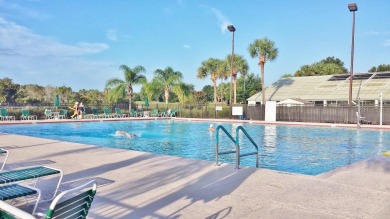2021 HVAC system! 2+ golf cart garage with air-conditioned on Monarch At Royal Highlands in Florida - for sale on GolfHomes.com, golf home, golf lot