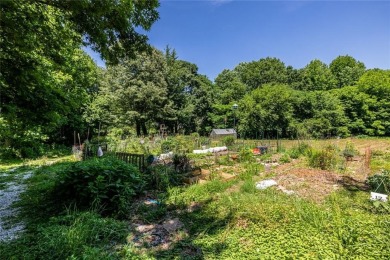 In a city where green space and true community living are on East Lake Golf Club in Georgia - for sale on GolfHomes.com, golf home, golf lot