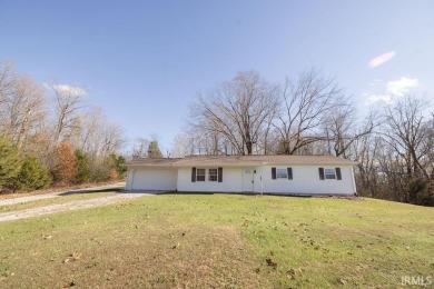 Charming 3-bedroom, 2-bathroom home located just 6 minutes west on Pine Woods Golf Course in Indiana - for sale on GolfHomes.com, golf home, golf lot