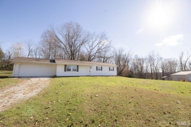 Charming 3-bedroom, 2-bathroom home located just 6 minutes west on Pine Woods Golf Course in Indiana - for sale on GolfHomes.com, golf home, golf lot