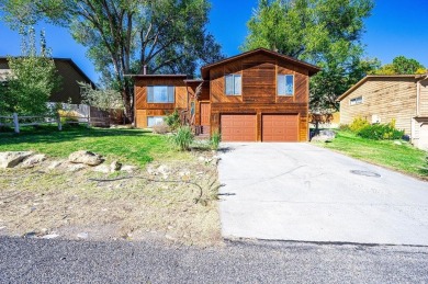 Spacious home in the Ridges near Redlands Mesa golf course on The Golf Club At Redlands Mesa in Colorado - for sale on GolfHomes.com, golf home, golf lot