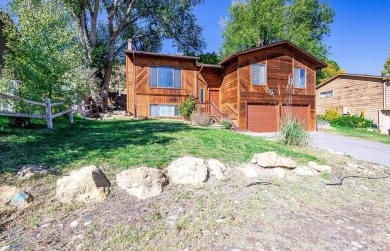 Spacious home in the Ridges near Redlands Mesa golf course on The Golf Club At Redlands Mesa in Colorado - for sale on GolfHomes.com, golf home, golf lot