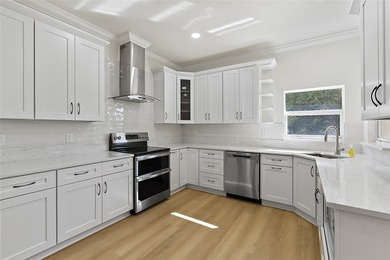 Where elegance meets comfort, this exceptional quality new on Sandridge Golf Course and Club in Florida - for sale on GolfHomes.com, golf home, golf lot