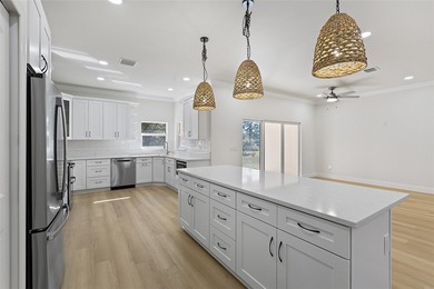 Where elegance meets comfort, this exceptional quality new on Sandridge Golf Course and Club in Florida - for sale on GolfHomes.com, golf home, golf lot