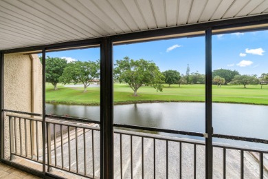 Enjoy stunning lake and golf course views from this beautifully on Fountains Golf and Country Club in Florida - for sale on GolfHomes.com, golf home, golf lot