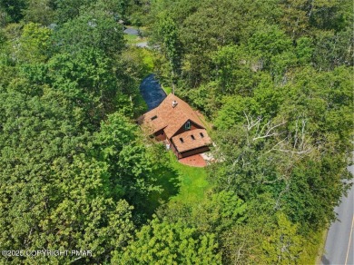 Charming Chalet in Pocono Farms Country Club. Welcome to this on Pocono Farms Country Club in Pennsylvania - for sale on GolfHomes.com, golf home, golf lot