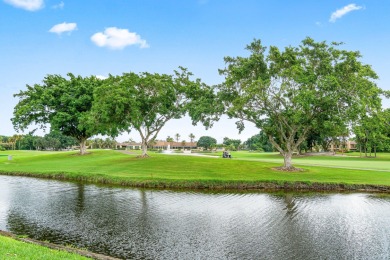 Enjoy stunning lake and golf course views from this beautifully on Fountains Golf and Country Club in Florida - for sale on GolfHomes.com, golf home, golf lot