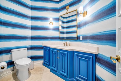 This custom-built home sits on more than two-thirds of an acre on Old Marsh Golf Club in Florida - for sale on GolfHomes.com, golf home, golf lot