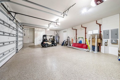 This custom-built home sits on more than two-thirds of an acre on Old Marsh Golf Club in Florida - for sale on GolfHomes.com, golf home, golf lot