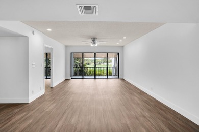 Welcome to 1701 Presidential Way, a beautifully renovated on The President Country Club in Florida - for sale on GolfHomes.com, golf home, golf lot