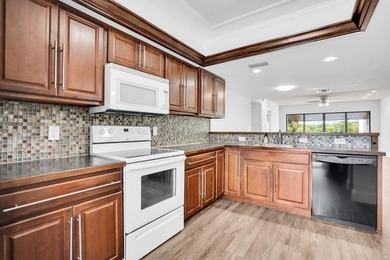 Welcome to 1701 Presidential Way, a beautifully renovated on The President Country Club in Florida - for sale on GolfHomes.com, golf home, golf lot