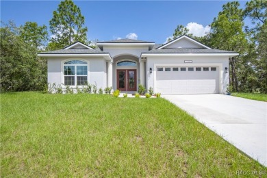 ABSOLUTELY BEAUTIFUL BRAND NEW 4 -bedroom, 2.5-bathroom home on Southern Woods Golf Club in Florida - for sale on GolfHomes.com, golf home, golf lot