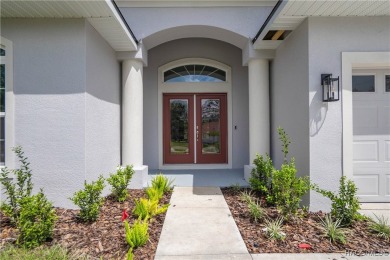 ABSOLUTELY BEAUTIFUL BRAND NEW 4 -bedroom, 2.5-bathroom home on Southern Woods Golf Club in Florida - for sale on GolfHomes.com, golf home, golf lot