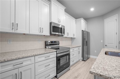 ABSOLUTELY BEAUTIFUL BRAND NEW 4 -bedroom, 2.5-bathroom home on Southern Woods Golf Club in Florida - for sale on GolfHomes.com, golf home, golf lot