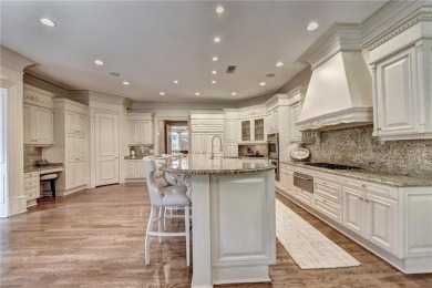 Nestled within the prestigious, gated community of Country Club on Country Club of the South in Georgia - for sale on GolfHomes.com, golf home, golf lot