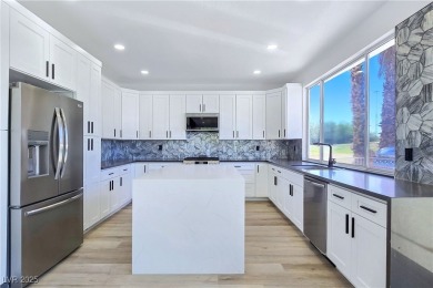 ** ONE OF A KIND BACKYARD SITS ON A LAKE AND TWO GOLF COURSE on Painted Desert Golf Club in Nevada - for sale on GolfHomes.com, golf home, golf lot