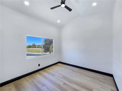 ** ONE OF A KIND BACKYARD SITS ON A LAKE AND TWO GOLF COURSE on Painted Desert Golf Club in Nevada - for sale on GolfHomes.com, golf home, golf lot