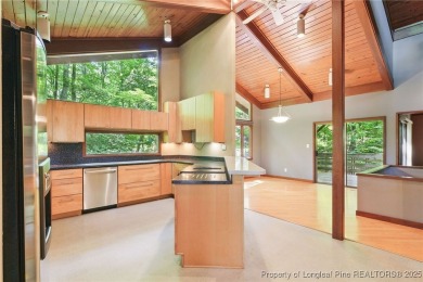 Calling all Mid-Century Modern lovers! This is a diamond in the on Carolina Trace Country Club in North Carolina - for sale on GolfHomes.com, golf home, golf lot