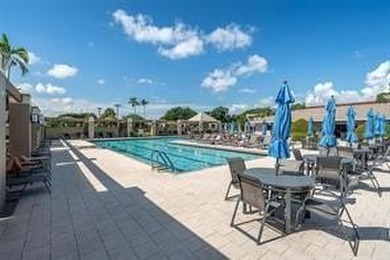 The condo is a 1BR/1.5BA in Wynmoor's 55+ Martinique II B on Wynmoor Golf Course in Florida - for sale on GolfHomes.com, golf home, golf lot
