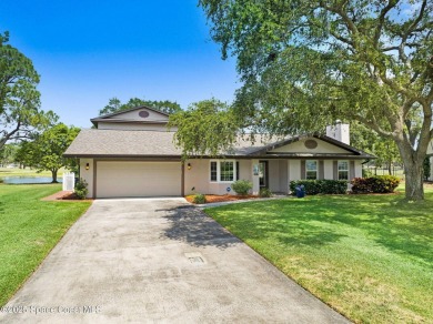 STUNNING home overlooking the 3rd, 4th 9th & 18th hole of the on Rockledge Country Club in Florida - for sale on GolfHomes.com, golf home, golf lot
