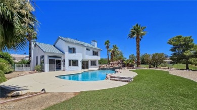 ** ONE OF A KIND BACKYARD SITS ON A LAKE AND TWO GOLF COURSE on Painted Desert Golf Club in Nevada - for sale on GolfHomes.com, golf home, golf lot