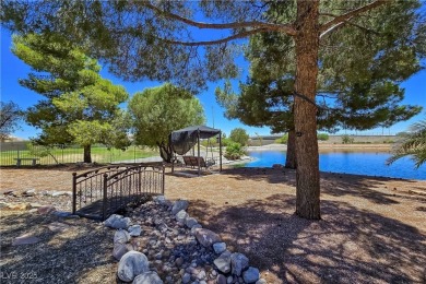 ** ONE OF A KIND BACKYARD SITS ON A LAKE AND TWO GOLF COURSE on Painted Desert Golf Club in Nevada - for sale on GolfHomes.com, golf home, golf lot
