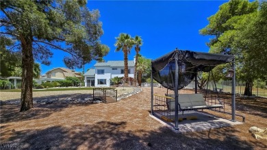 ** ONE OF A KIND BACKYARD SITS ON A LAKE AND TWO GOLF COURSE on Painted Desert Golf Club in Nevada - for sale on GolfHomes.com, golf home, golf lot
