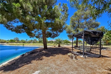 ** ONE OF A KIND BACKYARD SITS ON A LAKE AND TWO GOLF COURSE on Painted Desert Golf Club in Nevada - for sale on GolfHomes.com, golf home, golf lot