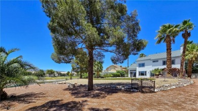 ** ONE OF A KIND BACKYARD SITS ON A LAKE AND TWO GOLF COURSE on Painted Desert Golf Club in Nevada - for sale on GolfHomes.com, golf home, golf lot