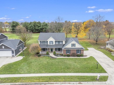 This traditional two story house sits on hole number 11 of Black on Black Squirrel Golf Club in Indiana - for sale on GolfHomes.com, golf home, golf lot