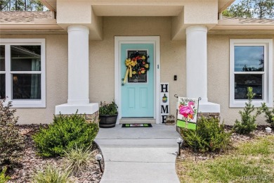 Welcome to this beautifully maintained 2024-built 3-bedroom on Citrus Springs Country Club in Florida - for sale on GolfHomes.com, golf home, golf lot