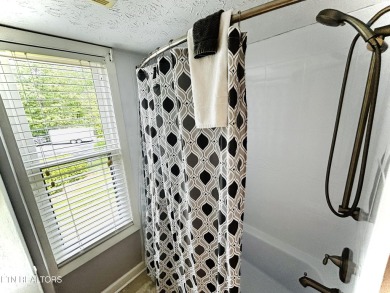 This 2-bedroom 1 bath luxury condo can accommodate up to 6 on Bent Creek Golf Course in Tennessee - for sale on GolfHomes.com, golf home, golf lot