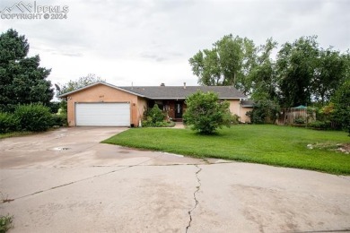 Great ranch style home overlooking Valley Hi Golf Course on a on Valley Hi Golf Course in Colorado - for sale on GolfHomes.com, golf home, golf lot