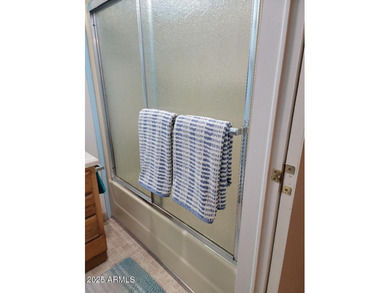 This is a lovely 2 bedroom 2 bath partially furnished home on 3 Parks Fairways in Arizona - for sale on GolfHomes.com, golf home, golf lot