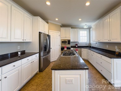 This beautiful custom home is located in the desirable Larkin on Fox Den Country Club in North Carolina - for sale on GolfHomes.com, golf home, golf lot