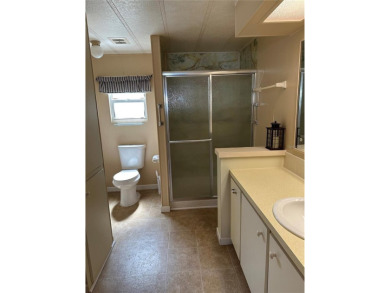 55+ gated golf course community.  (PRICE REDUCED) Newly updated on Zellwood Station Country Club in Florida - for sale on GolfHomes.com, golf home, golf lot