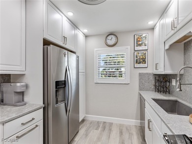 Enjoy golf course views from your spacious lanai! This inviting on Myerlee Country Club in Florida - for sale on GolfHomes.com, golf home, golf lot