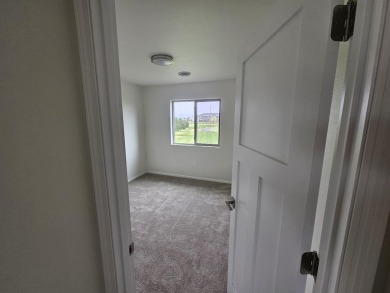 Brand new construction. Located in Hidden Bridge Ranch across on Hidden Bridge Golf Club in Wyoming - for sale on GolfHomes.com, golf home, golf lot